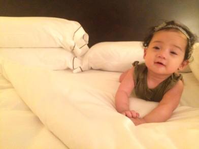 "What comfy sheets they have here at the Manila Peninsula mommy!"